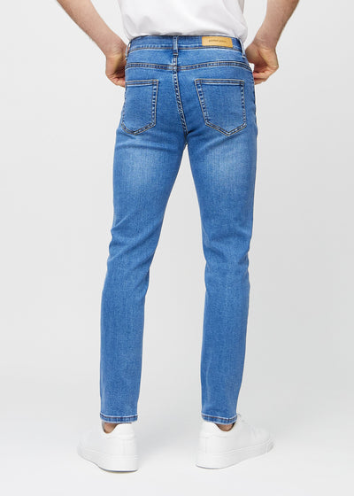 Denim slim jeans set bagfra, så man kan se hele produktet.